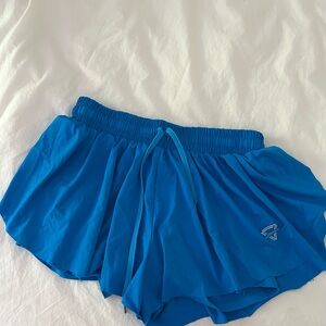 Blue Athletic Shorts with Elastic Waistband and Breathable Fabric